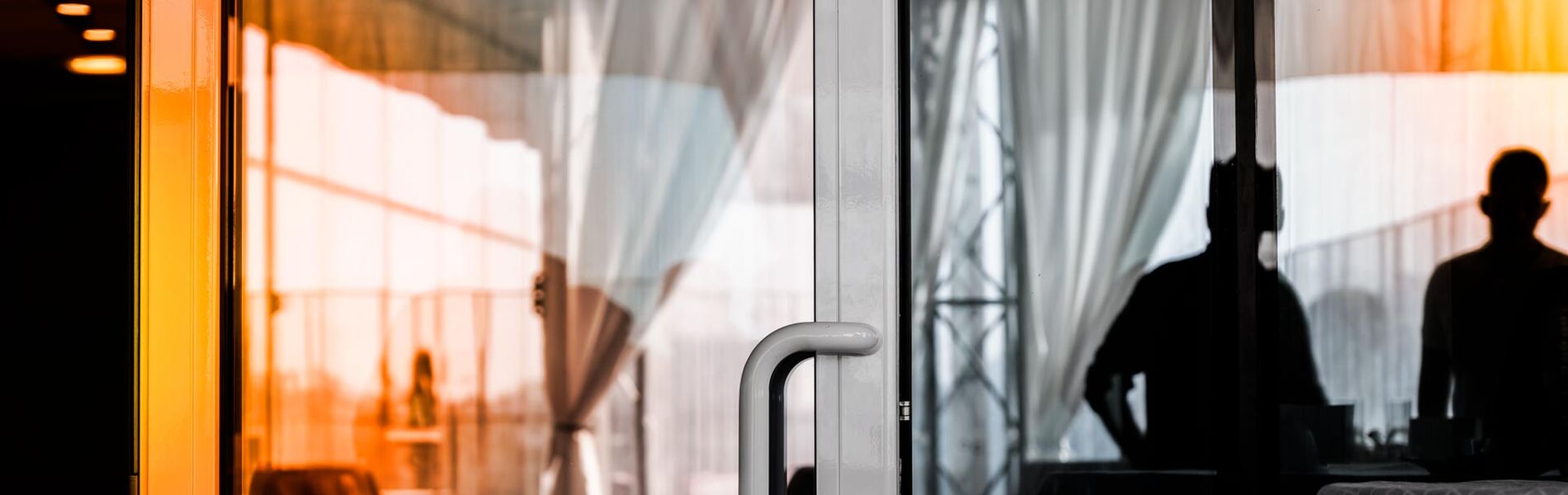 Offshore oil and gas industry with piping and valves, worker in foreground